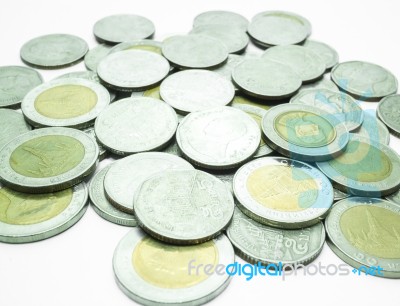 Group Of Thai Baht Coins On White Table Background Stock Photo