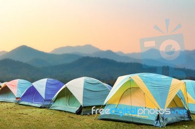 Group Of Tourist Tent On The Hills Stock Photo