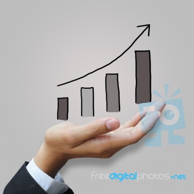 Growing Graph In Hand Stock Photo