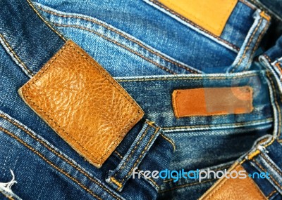 Grungy Leather Label On Jeans Stock Photo