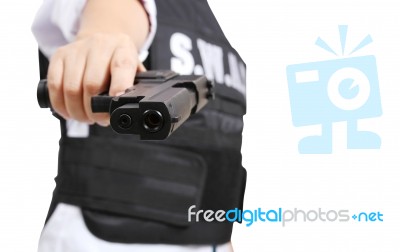 Gun And Swat Stock Photo