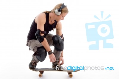 Guy balancing on Skateboard Stock Photo