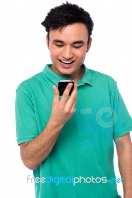 Guy Exicted About His Cellphone Stock Photo