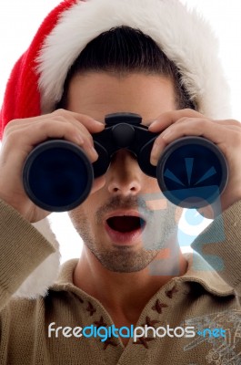 Guy Looking Through Binoculars Stock Photo