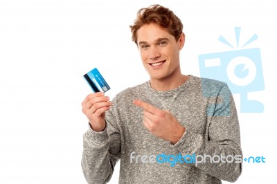 Guy Pointing At His Credit Card Stock Photo