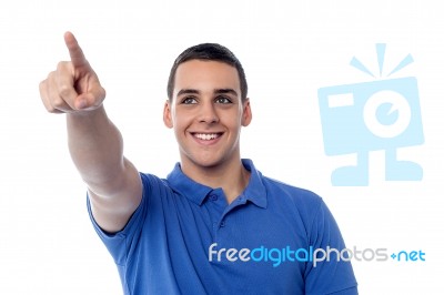 Guy Pointing At Something Stock Photo