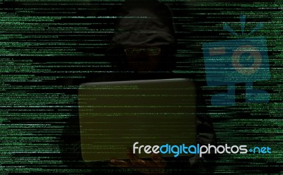 Hacker Stealing Data Stock Photo