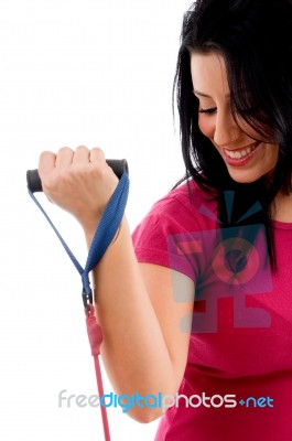 Half-length View Of Female Exercising With Rope On White Background Stock Photo