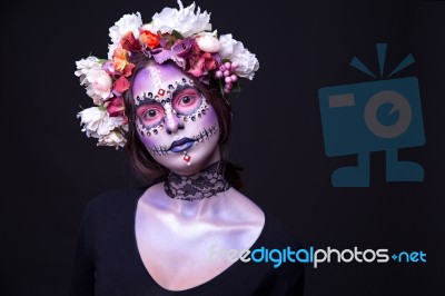 Halloween Makeup With Rhinestones And Wreath Of Flowers Stock Photo