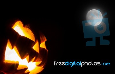 Halloween Scary Face Pumpkin  On Black Background Stock Photo