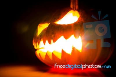 Halloween Scary Face Pumpkin  On Black Background Stock Photo