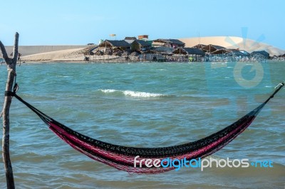 Hammocks And Beach Chairs Under The Shade Of A Palapa Sun Roof U… Stock Photo