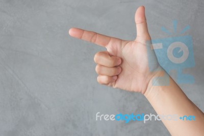 Hand Action Gesture On Grey Background Stock Photo