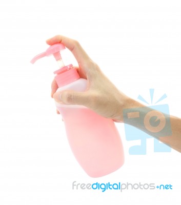 Hand Apply Bottle Pump On White Background Stock Photo