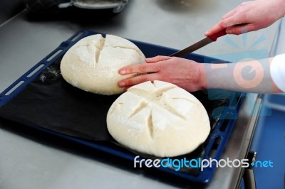 Hand Cutting Dough Stock Photo