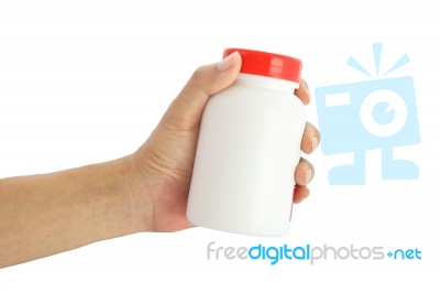 Hand Give Medical Bottle On White Background Stock Photo