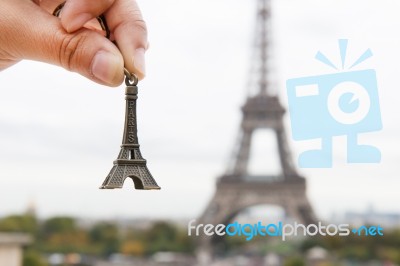 Hand Hold Eiffel Model Stock Photo