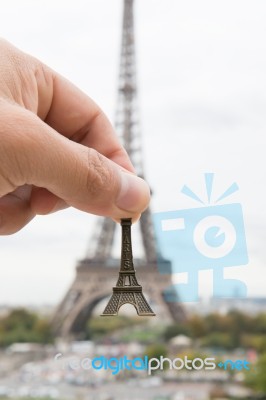 Hand Hold Eiffel Model Stock Photo