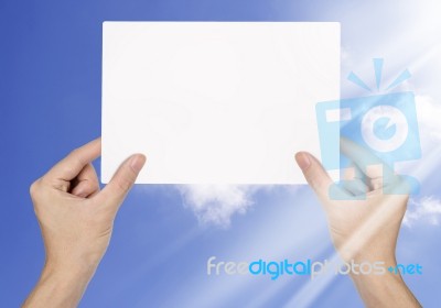 Hand Holding Blank Paper Stock Photo