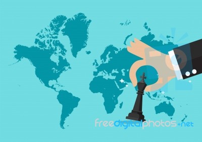 Hand Holding Chess Figure With World Map Background Stock Image