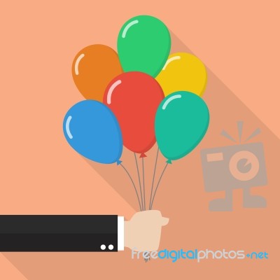 Hand Holding Colorful Balloons Stock Image