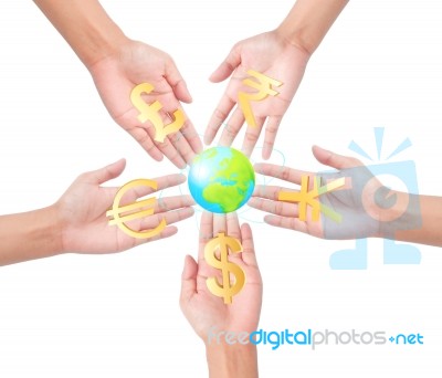 Hand Holding Different Currency Symbols Stock Image