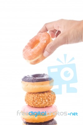 Hand Holding Donut Stock Photo