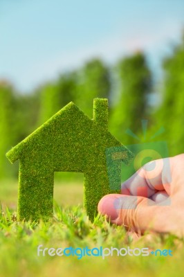 Hand Holding Eco House Icon Stock Photo