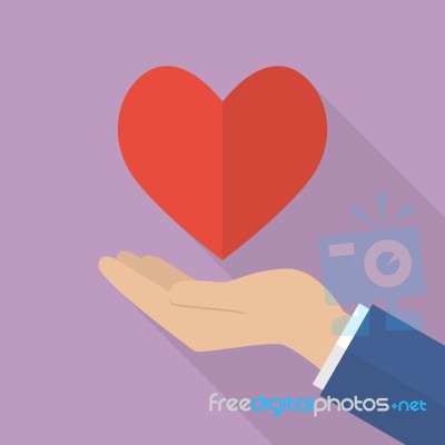 Hand Holding Heart Stock Image