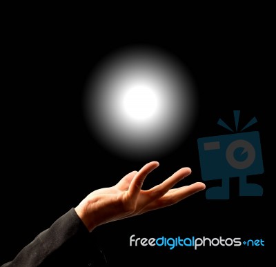 Hand Holding Light Stock Photo