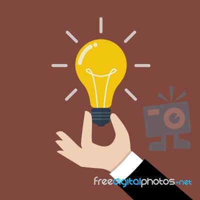 Hand Holding Light Bulb Stock Image