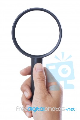 Hand Holding Magnifying Glass Stock Photo