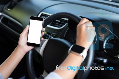 Hand Holding Phone White Screen And Driving Car Stock Photo