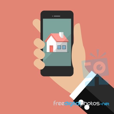 Hand Holding Smart Phone With House Icon Stock Image