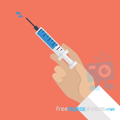 Hand Holding Syringe Stock Image