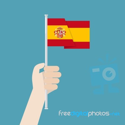 Hand Holding Up Spain Flag Stock Image