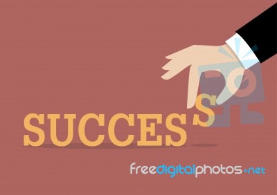 Hand Inserts The Last Alphabet Into Success Word Stock Image