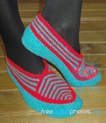 Hand Knitted Female Slippers Stock Photo