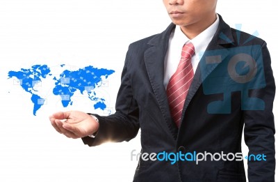 Hand Of Business Man And Blue World Map Stock Photo