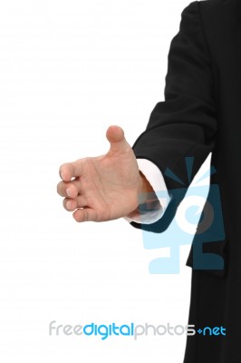 Hand Of Business Man Try To Grasp On White Background Stock Photo