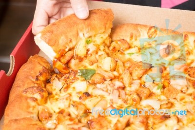 Hand On Extra Cheese Pizza Pan Stock Photo