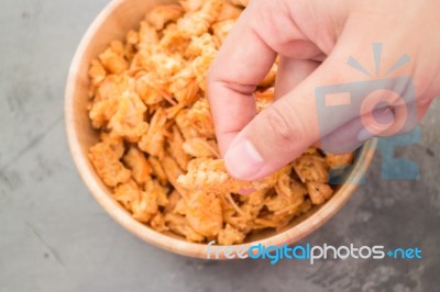 Hand On Fried Crispy Shrimp Head Stock Photo