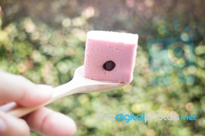 Hand On Serving Thai Steamed Cotton Cake Stock Photo