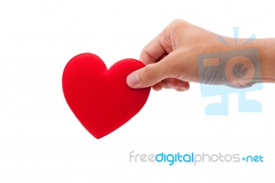 Hand Picking Heart Stock Photo