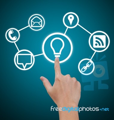 Hand Pointing To Business Icons Stock Photo