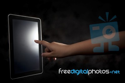 Hand Pointing To Tablet Stock Photo