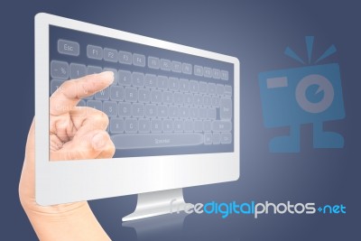 Hand Pressing Keyboard On Monitor Stock Image