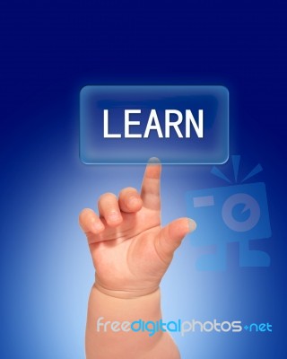 Hand Pressing Learn Button Stock Photo