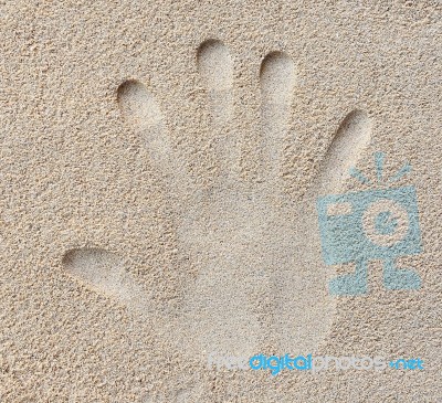 Hand Print In Sand Stock Photo