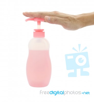 Hand Push Bottle Pump On White Background Stock Photo